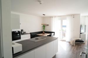 Kuchyň nebo kuchyňský kout v ubytování Ferienwohnung Auszeit