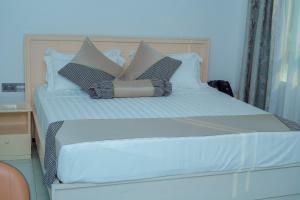 Letto o letti in una camera di Hotel Amaranth