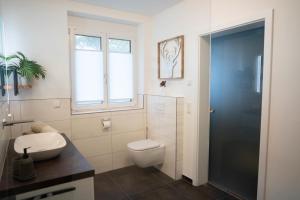 Koupelna v ubytování Ferienwohnung Auszeit + 33 fotografií