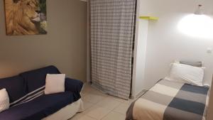 Postel nebo postele na pokoji v ubytování chambres d'hôtes du moulin