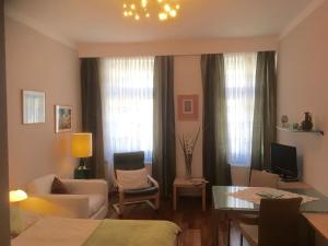 Televízia a/alebo spoločenská miestnosť v ubytovaní Apartment Philadelphia Vienna