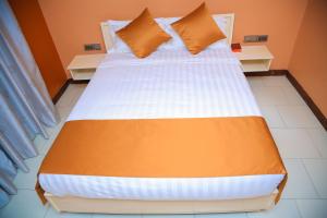 Letto o letti in una camera di Hotel Amaranth