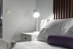 Кровать или кровати в номере #G30 Chic 1 BR apartment in the centre of Volos