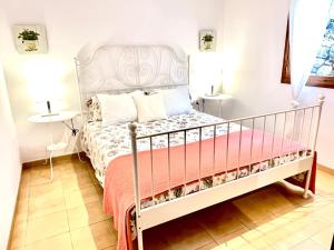 Posteľ alebo postele v izbe v ubytovaní Es Penyal de Tuent