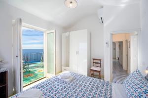 Кровать или кровати в номере Villa Benedetta