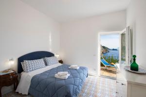Кровать или кровати в номере Villa Benedetta