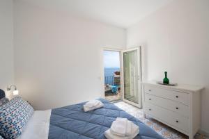 Кровать или кровати в номере Villa Benedetta