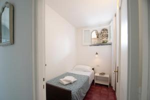 Кровать или кровати в номере Villa Benedetta