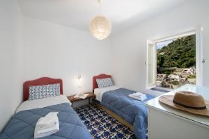 Кровать или кровати в номере Villa Benedetta