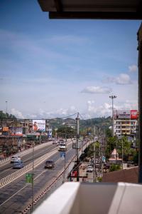 a view of a city street with cars on the road at Hotel City View INN in Guwahati