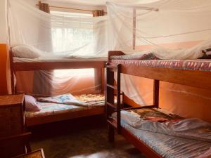Postel nebo postele na pokoji v ubytování Yes Hostel