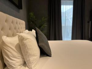 Voodi või voodid majutusasutuse Sliema Studios toas