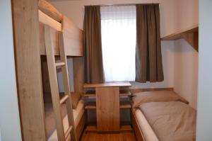 Postel nebo postele na pokoji v ubytování Apartment Haus Van der Leij