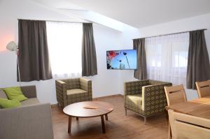 TV a/nebo společenská místnost v ubytování Apartment Haus Van der Leij