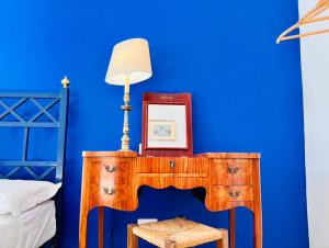 A bed or beds in a room at Aqua Claudia and Anio Novus Apartments