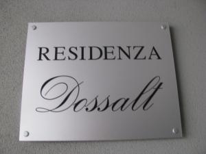 um sinal na parede com as palavras "restaurantella pasta" em Appartamenti Residenza Dossalt em Baselga di Pinè