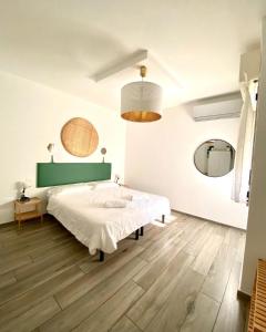 Кровать или кровати в номере RESIDENZA 8