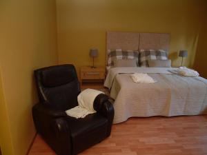 Posteľ alebo postele v izbe v ubytovaní Apartments and Suites Kremnica