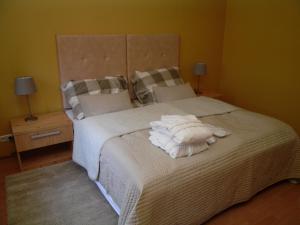 Posteľ alebo postele v izbe v ubytovaní Apartments and Suites Kremnica