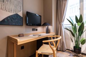 A television and/or entertainment centre at Dash Living on Prat