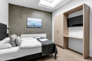 Postel nebo postele na pokoji v ubytování Hotel Vera