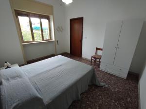 Postel nebo postele na pokoji v ubytování Masseria Carrozzi