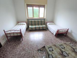 Postel nebo postele na pokoji v ubytování Masseria Carrozzi