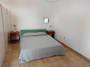 Postel nebo postele na pokoji v ubytování Masseria Carrozzi