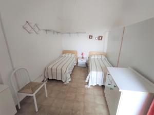 Postel nebo postele na pokoji v ubytování Masseria Carrozzi