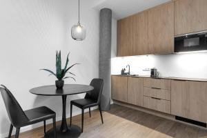 Kuchyň nebo kuchyňský kout v ubytování Hotel Vera