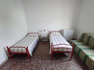 Postel nebo postele na pokoji v ubytování Masseria Carrozzi