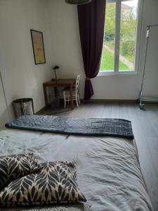 Posteľ alebo postele v izbe v ubytovaní La maison d'adèle