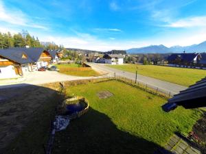 an aerial view of a yard with a house and a road at Haus Kartoner in Schladming