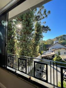 a view from the balcony of a house at Residencial Jardim dos Pinheiros B in Canela