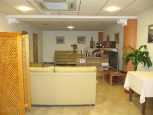 Posezení v ubytování Hostal Meseguer