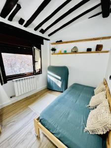 Posteľ alebo postele v izbe v ubytovaní La casita del rio + 4 fotografie