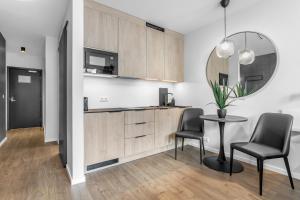Kuchyň nebo kuchyňský kout v ubytování Hotel Vera + 37 fotografií