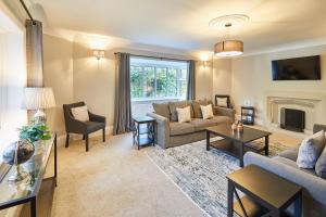 a living room with a couch and a fireplace at Host & Stay - White Lodge in Scalby