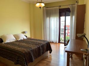 Postel nebo postele na pokoji v ubytování RAMBLA CENTRO - Apartamento excepcional en el corazón de Almería