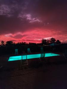 Bazén v ubytování La Tribu Ecolodge y Camping nebo v jeho okolí