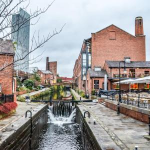 a canal in the middle of a city with buildings at The Bridgewater Studio @ The Gathering - Sleeps Up To 4 in Sale