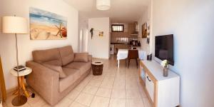 TV a/nebo společenská místnost v ubytování Royal Holiday Home
