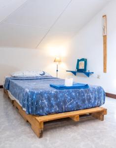 A bed or beds in a room at Simabo's Backpackers' Hostel