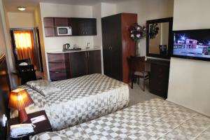 Letto o letti in una camera di Mozart Hotel