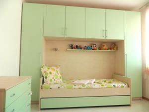 A bed or beds in a room at Holiday Apartment in Riviera Complex Még 30 kép