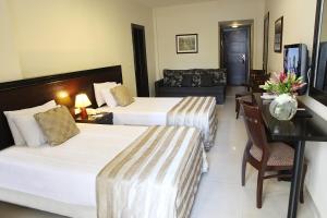 Letto o letti in una camera di Mozart Hotel