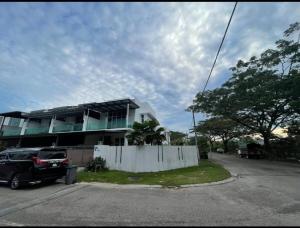 a car parked in front of a house at 55 Cozy Home Mount Austin Eco Adda Setia Indah Daya in Johor Bahru