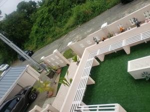 an aerial view of a house with a lawn at Skyland Oasis in Carnbee Village