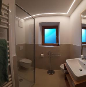 Koupelna v ubytování Residence Haus Peder