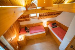 an overhead view of a room with bunk beds at Chalet Zlatorog in Bohinj